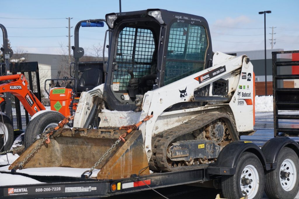 How easy is it to transport a Bobcat between jobs