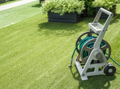 garden watering irrigation hose on the lawn